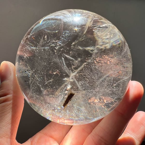 Slim brown inclusion and crossing veils in the lower half of the sphere
