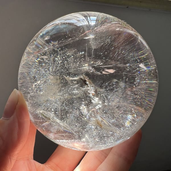 Side view of the sphere with a small dark inclusion and starry haze