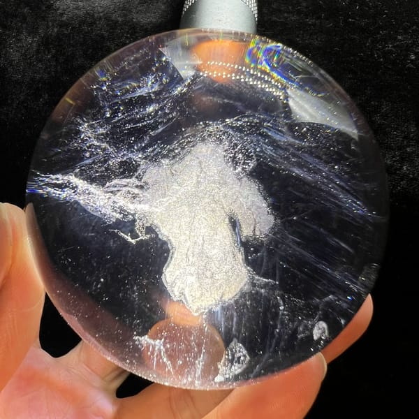 Glittering cotton-like cloud and wispy feathers in the smoky sphere