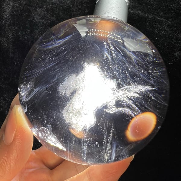 Repeat backlit view of the glowing central cloud in smoky quartz