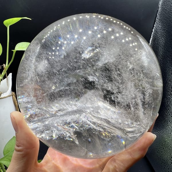 White feathered mountain ridge across the lower half of the sphere