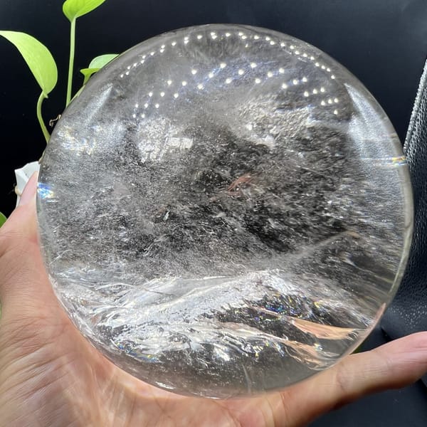 Wide view of the 12.2 cm sphere with its white ridge and clear top