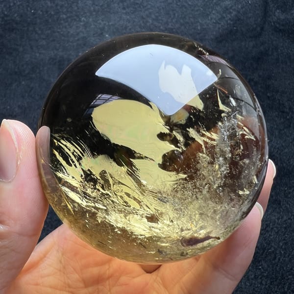 Repeat of the golden veil view with light reflected at the top of the sphere