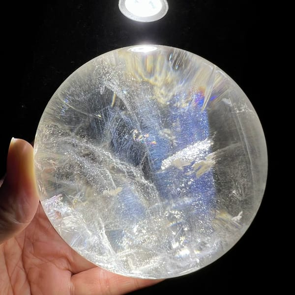 Torch-lit sphere revealing a blue haze behind the white phantom layers