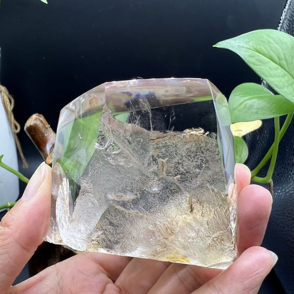 Back view of the quartz with hazy golden inclusions low inside