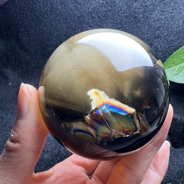 Rainbow inclusion and smoky shading seen from a lower angle