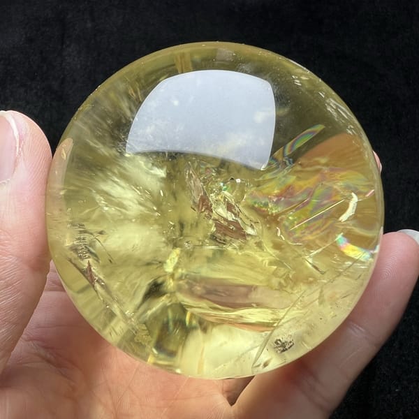 Golden veils and fine needles seen through the clear citrine