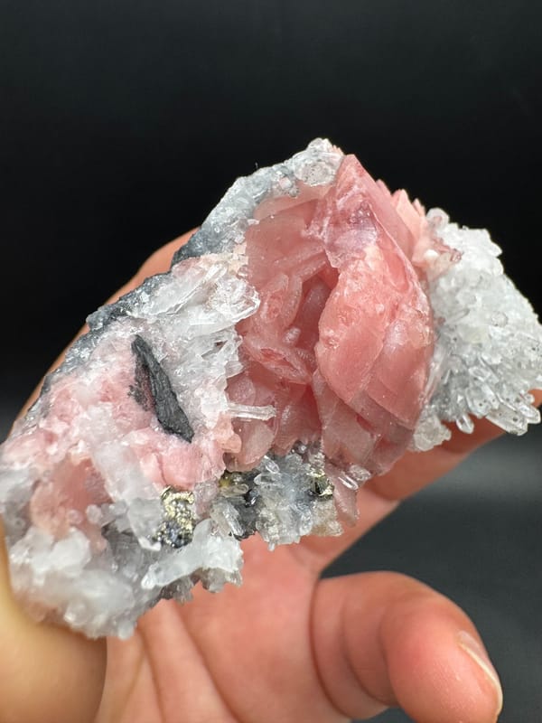 Rhodochrosite from Wuzhou, Guangxi, China, individual mineral specimen view 2