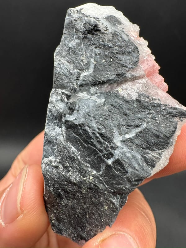 Rhodochrosite from Wuzhou, Guangxi, China, individual mineral specimen view 3