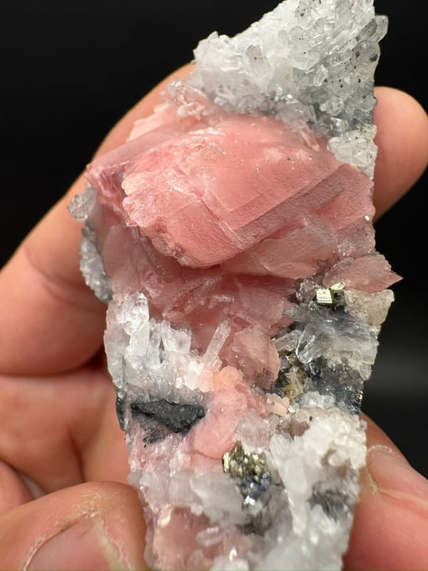 Rhodochrosite from Wuzhou, Guangxi, China, individual mineral specimen view 4