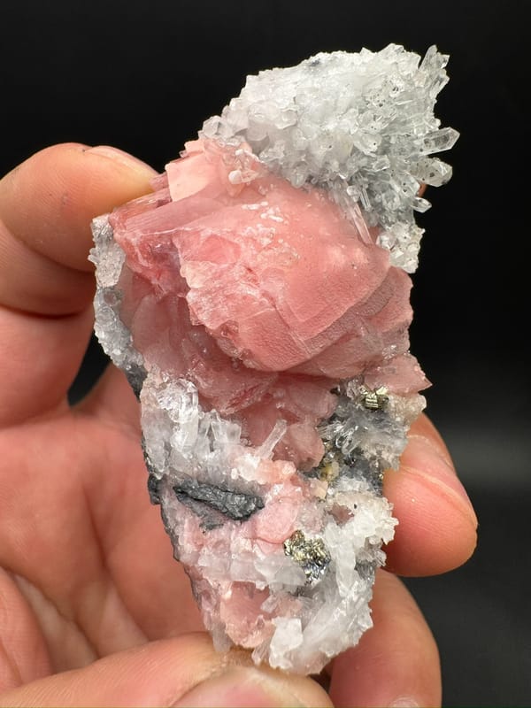 Rhodochrosite from Wuzhou, Guangxi, China, individual mineral specimen view 5