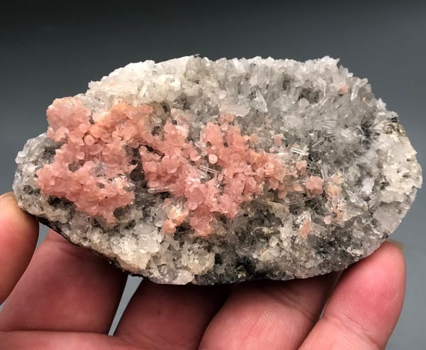 Rhodochrosite from Wuzhou, Guangxi, China, individual mineral specimen view 6