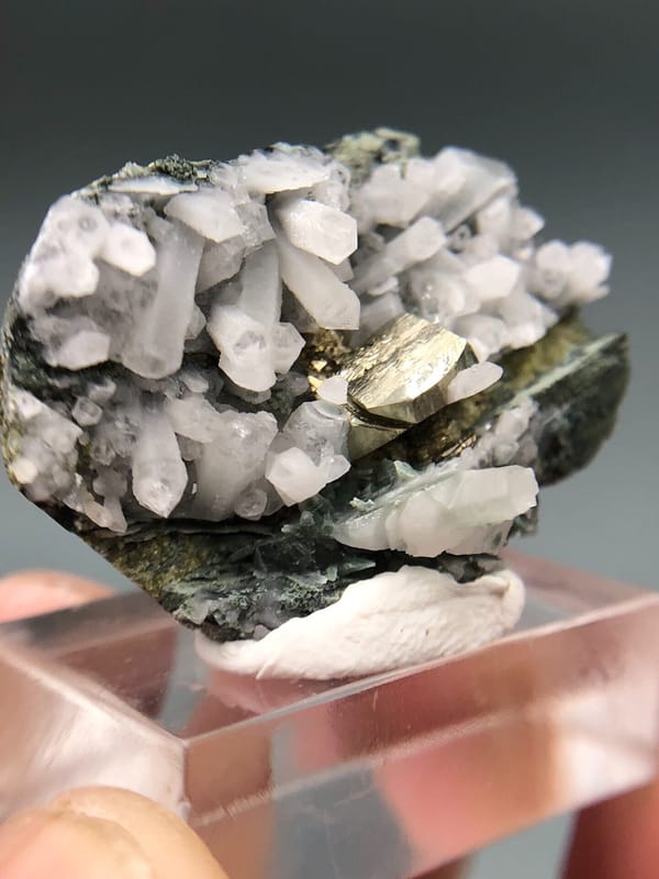 Golden Pyrite between Pale Quartz on Garnet Matrix