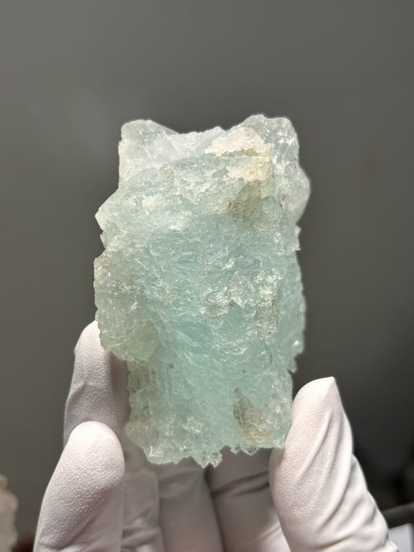 Etched aquamarine plate from Xuebaoding, Sichuan, China, reverse side