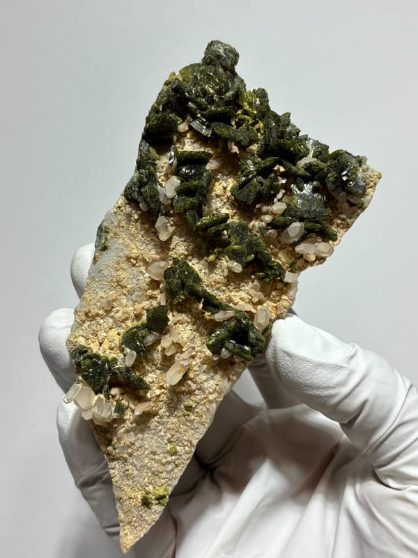 Plate of green epidote and quartz on tan matrix from Sichuan, China, second angle