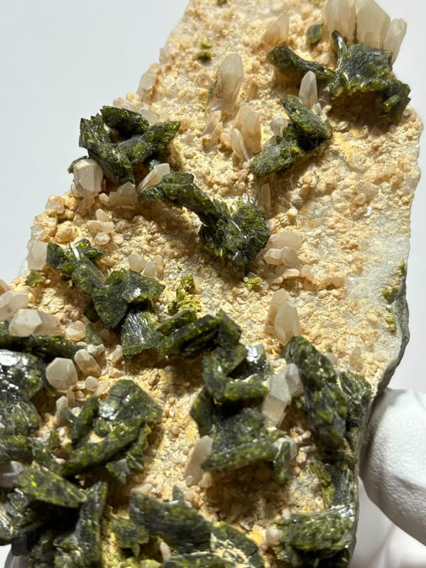 Plate of green epidote and quartz on tan matrix from Sichuan, China, reverse side