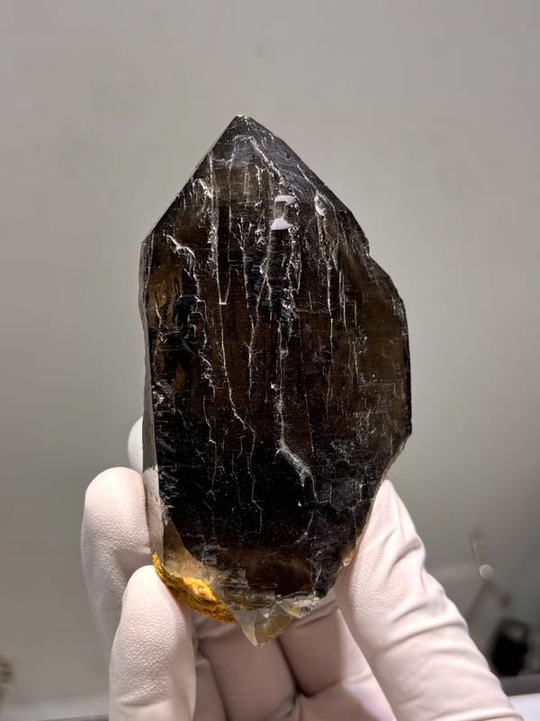Dark smoky quartz floater from Fujian, China, side view