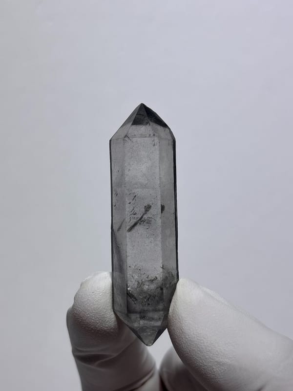 Grey double-terminated quartz wand from Yunnan, China, reverse side