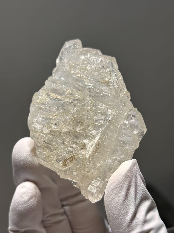 Skeletal quartz floater with sculpted faces from Jinkouhe, Sichuan, China, second angle