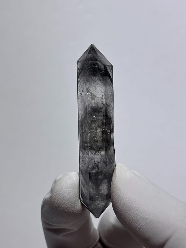 Dark smoky double-terminated quartz wand from Yunnan, China, reverse side
