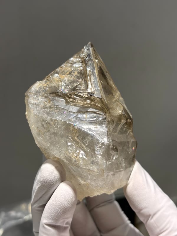 Large skeletal quartz with complete tip from Jinkouhe, Sichuan, China, close-up of the crystal faces
