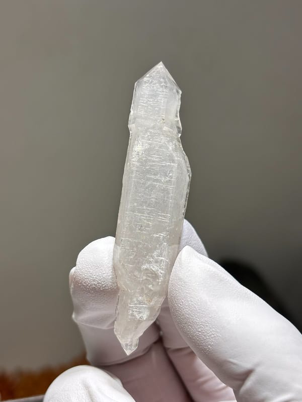 White sugar-core double-terminated quartz from Yunnan, China, close-up of the crystal faces