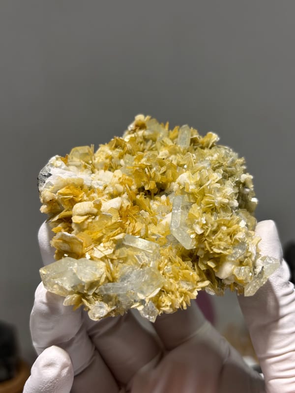 Golden mica rosettes with aquamarine and feldspar from Xuebaoding, Sichuan, China, second angle