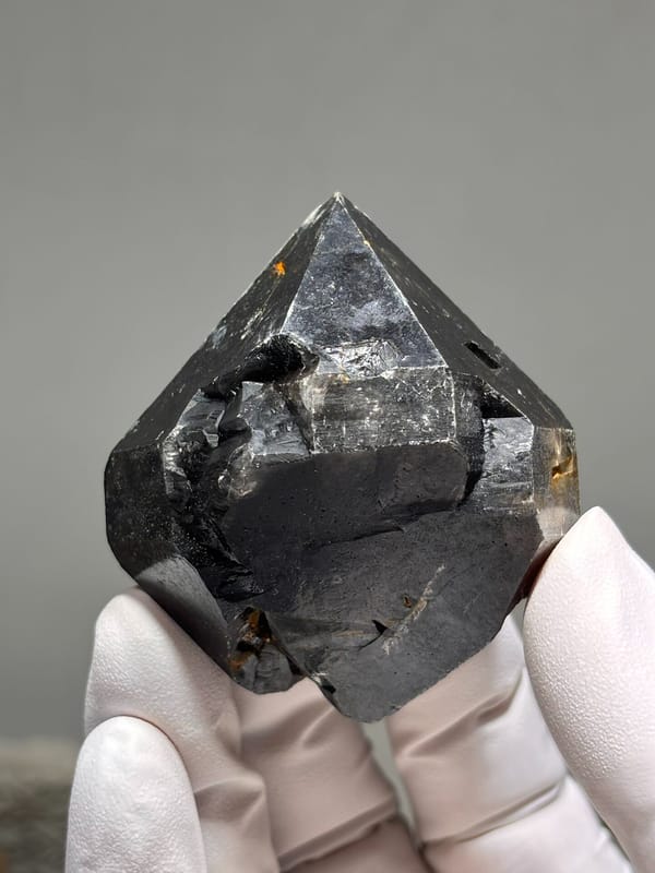 Stout jet-black double-terminated quartz from Guizhou, China, reverse side