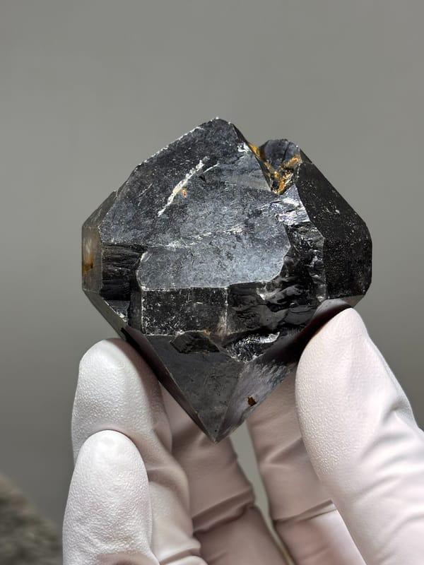 Stout jet-black double-terminated quartz from Guizhou, China, top view