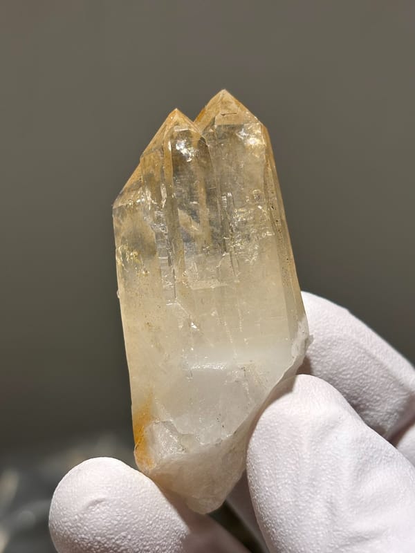 Pale golden cathedral quartz point from Xuebaoding, Sichuan, China, reverse side