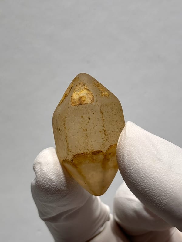 Six-window water-worn quartz with white cap from Yunnan, China, second angle