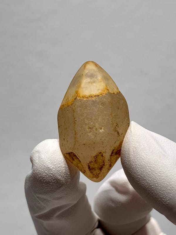 Six-window water-worn quartz with white cap from Yunnan, China, reverse side