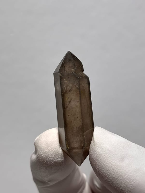 Smoky sketch-pattern double-terminated quartz from Yunnan, China, close-up of the crystal faces