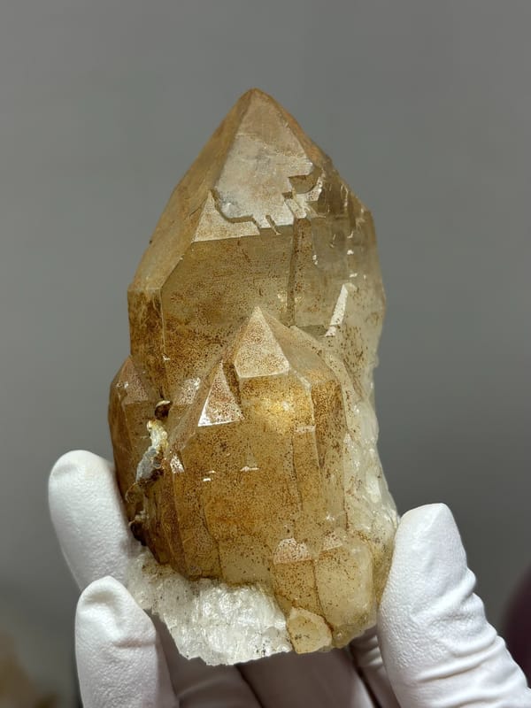 Golden quartz point with sculpted form from Xuebaoding, Sichuan, China, reverse side