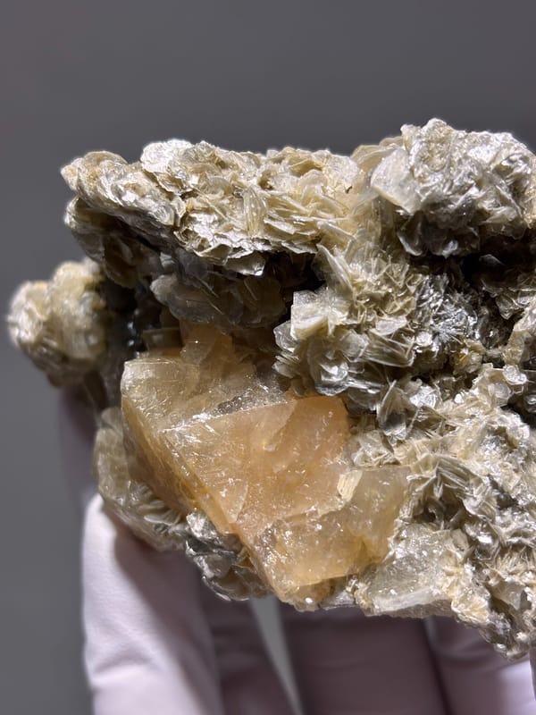 Pale yellow scheelite plate with golden mica from Xuebaoding, Sichuan, China, second angle