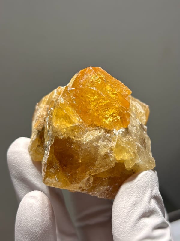 Orange scheelite crystal group from Xuebaoding, Sichuan, China, second angle