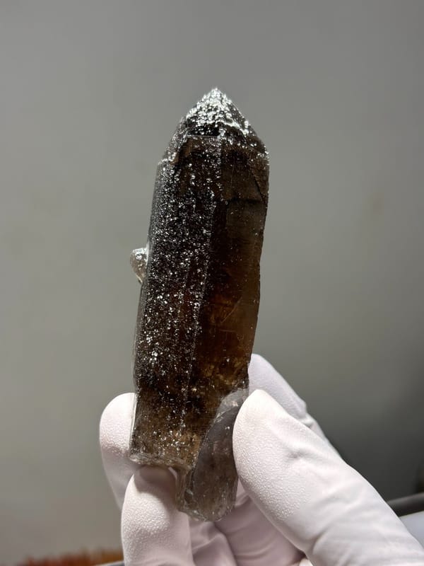 Dark smoky quartz point with complete tip from Fujian, China, second angle