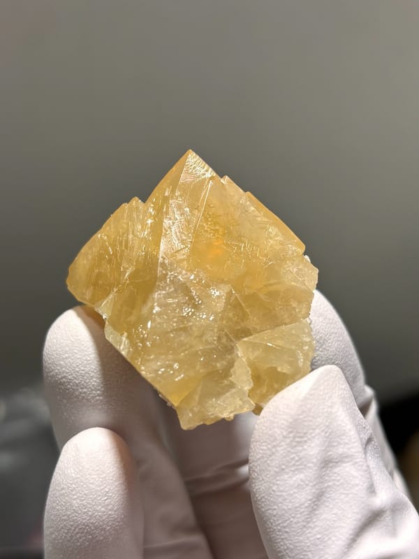 Honey-orange scheelite with complete tip from Xuebaoding, Sichuan, China, second angle