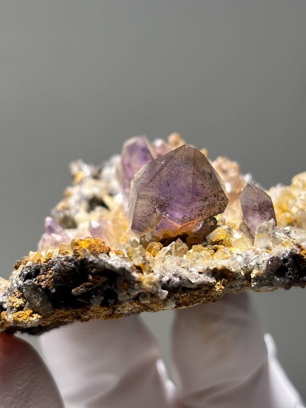 Purple amethyst points on druse plate from Zimbabwe, top view
