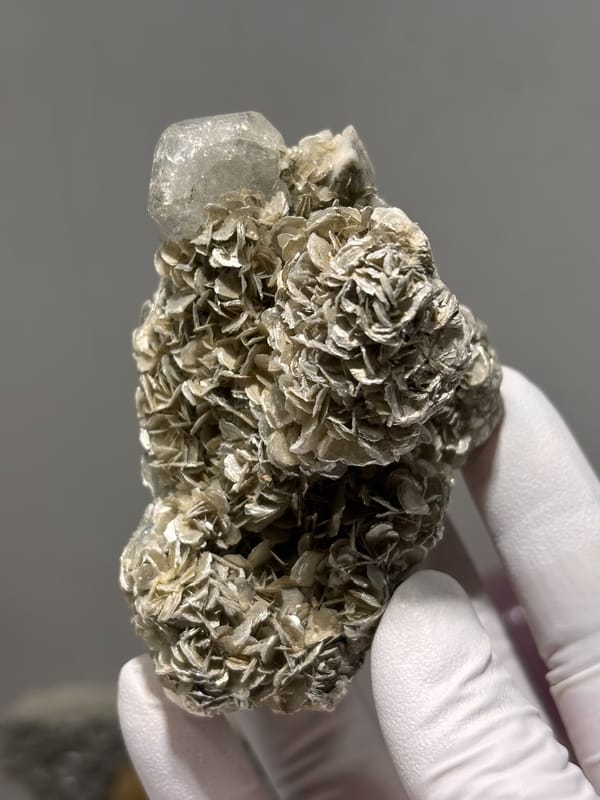 Etched hollowed aquamarine on mica and feldspar from Xuebaoding, Sichuan, China, reverse side