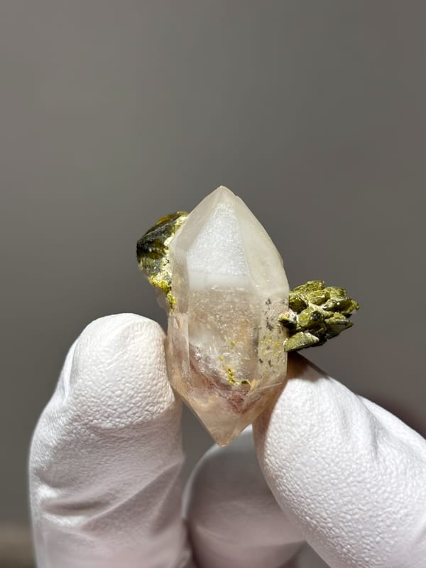 Double-terminated garden quartz with epidote cluster from Sichuan, China, reverse side