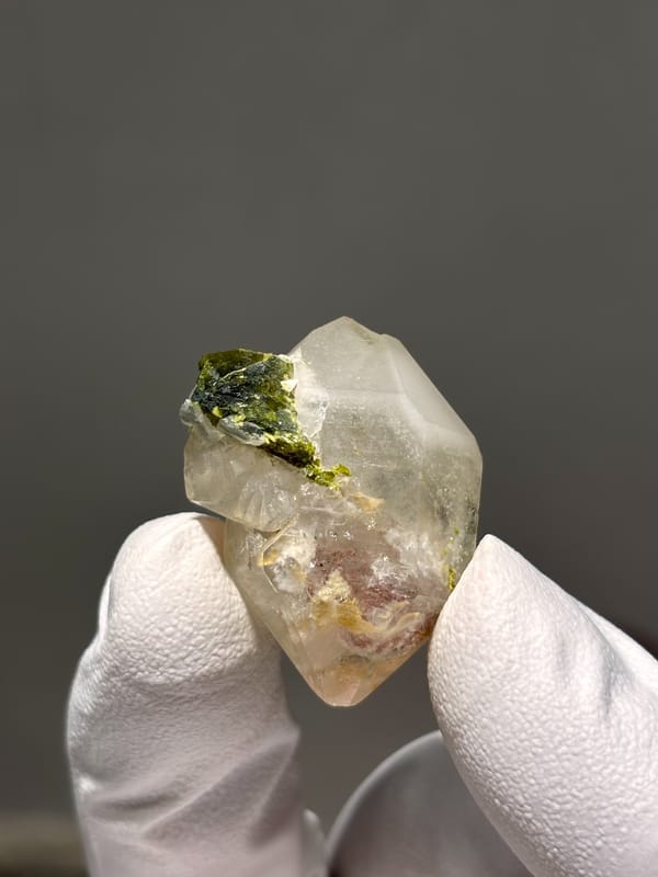 Double-terminated garden quartz with epidote cluster from Sichuan, China, top view