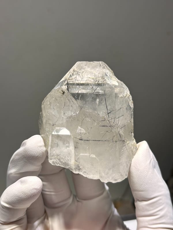 Clear quartz with jamesonite needles on mica from Xuebaoding, Sichuan, China, second angle