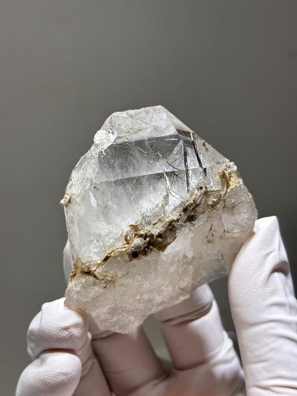 Clear quartz with jamesonite needles on mica from Xuebaoding, Sichuan, China, reverse side