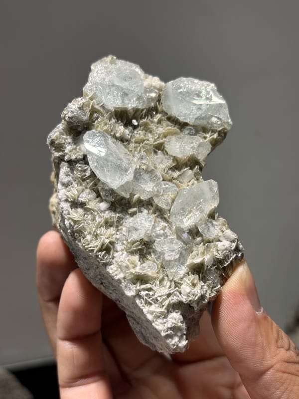 Grey mica plate with pale aquamarine crystals from Xuebaoding, Sichuan, China, second angle