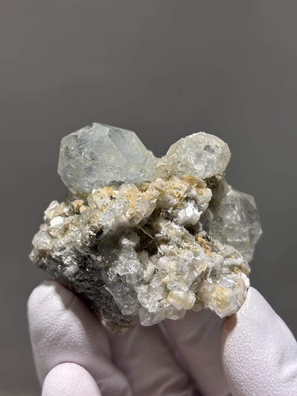 Pale blue aquamarine over white mica and feldspar from Xuebaoding, Sichuan, China, second angle