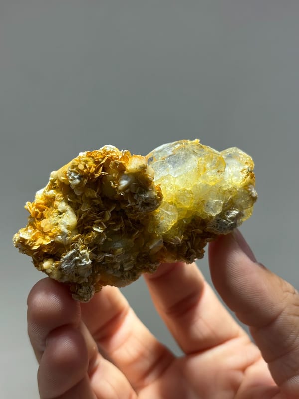 Two-sided aquamarine plate with golden mica and feldspar from Xuebaoding, Sichuan, China, second angle
