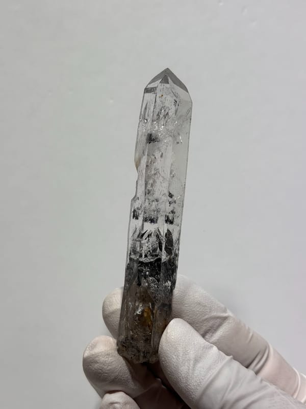 Black-included quartz wand from Jinkouhe, Sichuan, China, reverse side