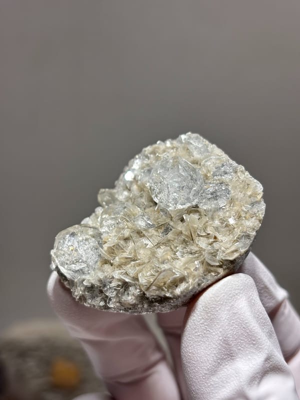 Aquamarine plate on mica from Xuebaoding, Sichuan, China, reverse side