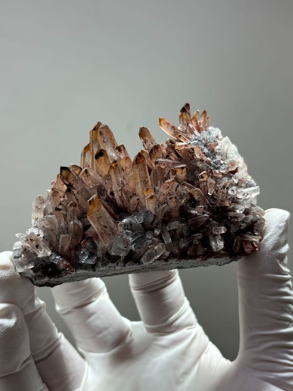 Red-skinned quartz cluster from Guangdong, China, second angle